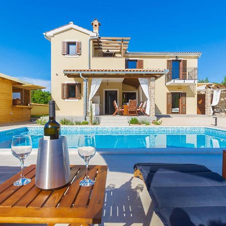 Villa David - Luxurious Secluded Villa With A Heated Pool Butkovići Eksteriør bilde